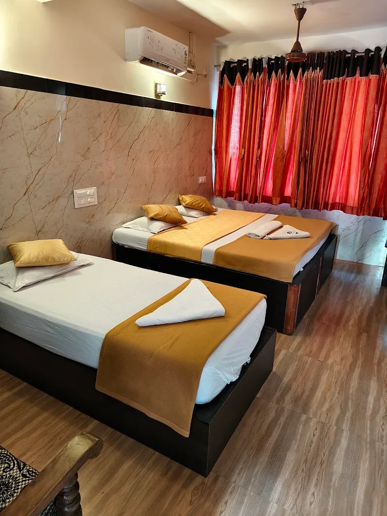 Guest room interior at Yamuna Vihar Tourist Home